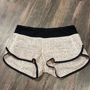 Size 4 Rare Lululemon speed up Pale pink and black speed up shorts.